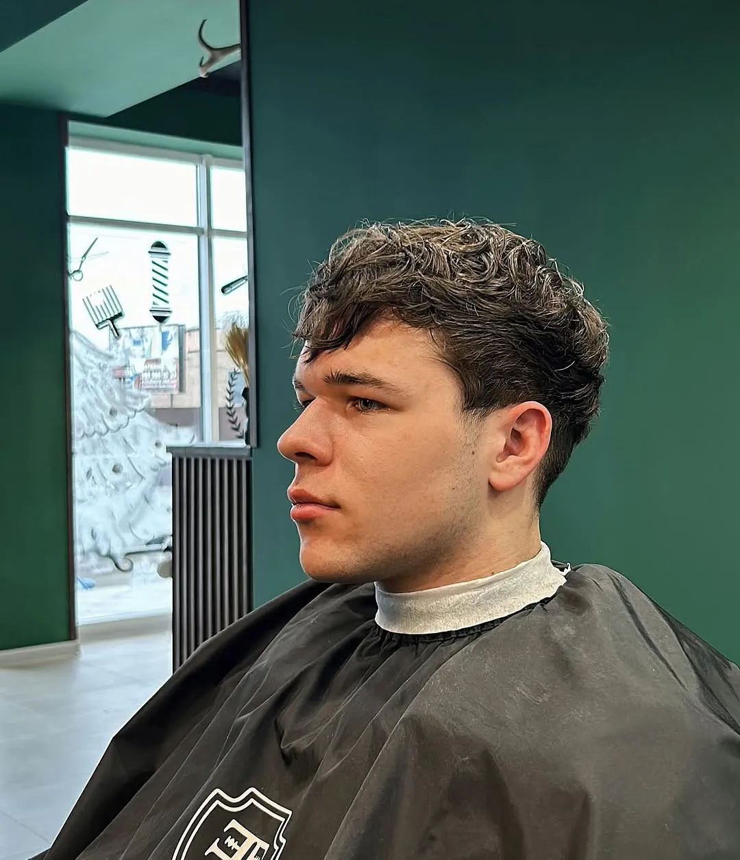 Клієнт барбершопу Freedom — стильна стрижка кучерявого волосся